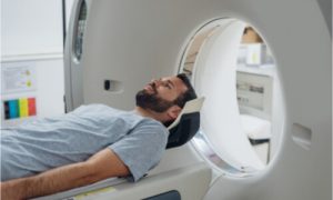 The patient undergoes a CT scan.